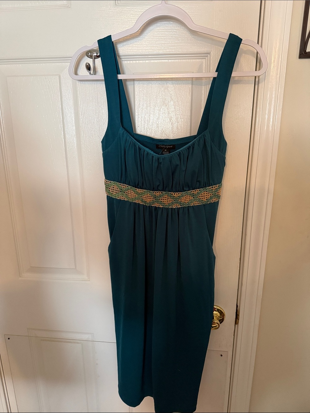 Intrigue Sleeveless Teal Empire-Waist Dress with Embroidered Band